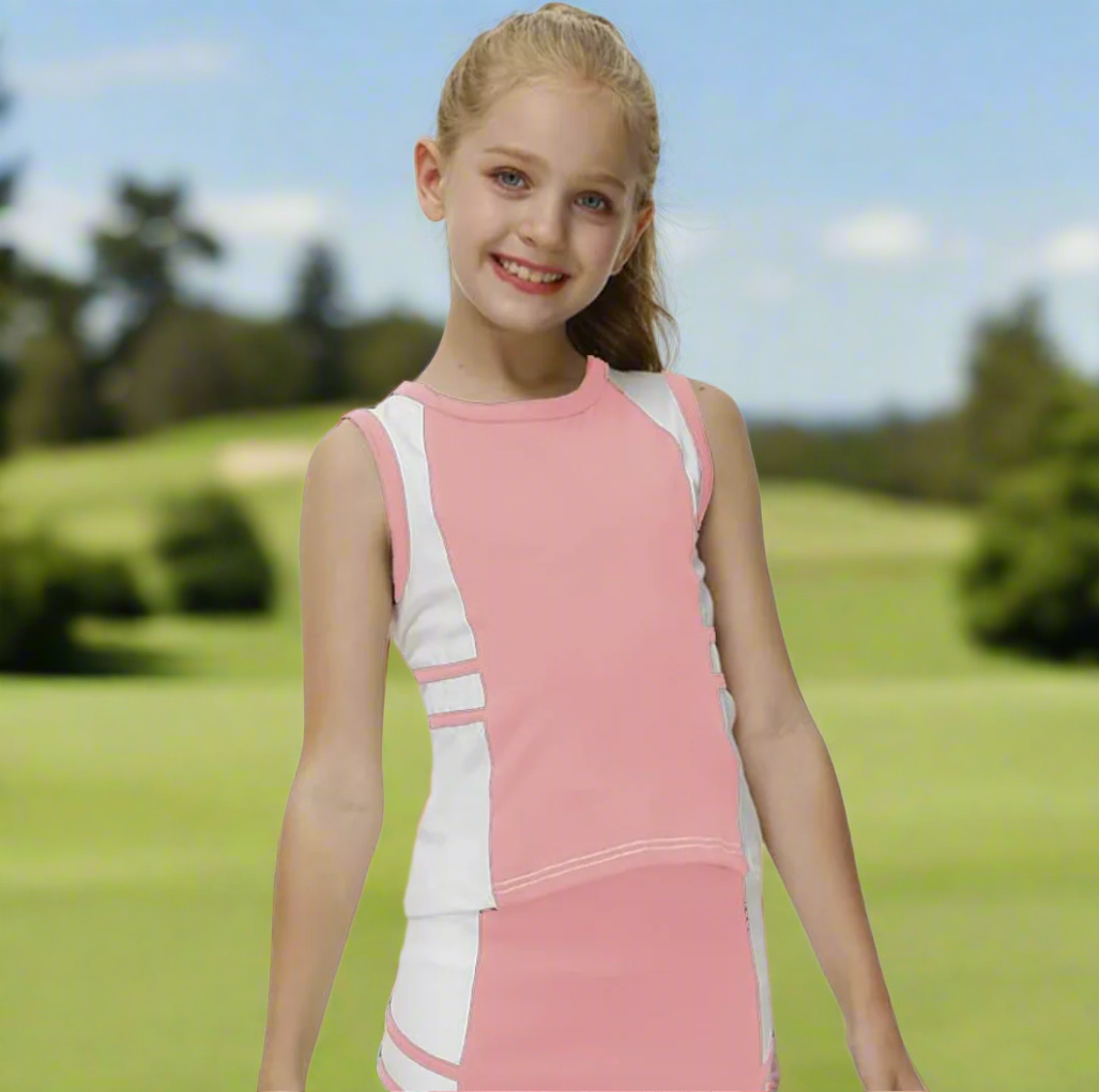 Young girl wearing a pink and white sleeveless dress on a white background