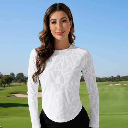 Woman wearing a white textured long-sleeve top against a white background